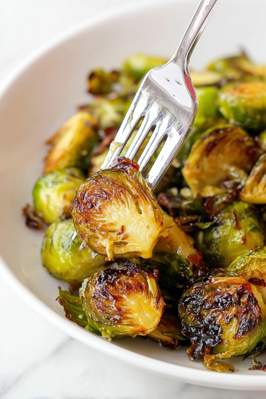 A white plate filled with a pile of fresh, green Brussels sprouts. Each Brussels sprout is tightly wrapped with shiny green leaves, and the pale yellowish stems are visible on top. In the background, slightly out of focus, there are two tall bottles, one with a label showing honey and the other with dark liquid, both set on a white marbled surface. The image is bright and clear, with a natural kitchen feel. photo taken with an iphone --ar 2:3 --v 7